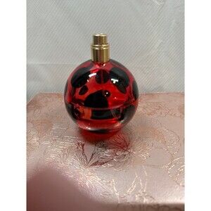 Marc Jacobs Dot perfume is over half full does not have the original lid.